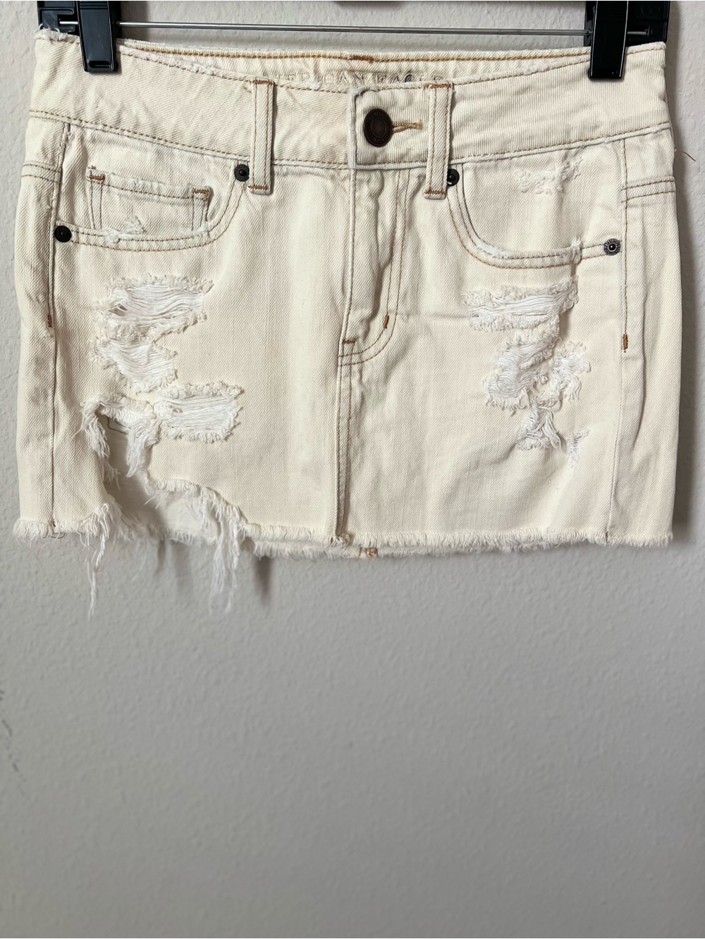 American Eagle Outfitters Cream Ripped Mini Denim Skirt Size 0